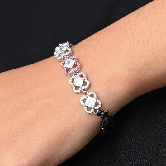 Elegant silver bracelet featuring a stunning white gemstone