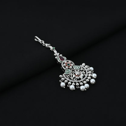 Girls' silver maang tikka adorned with a striking sunflower design.