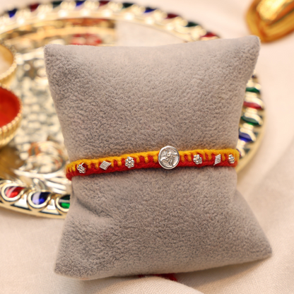 Swastik Charm Rakhi in Silver