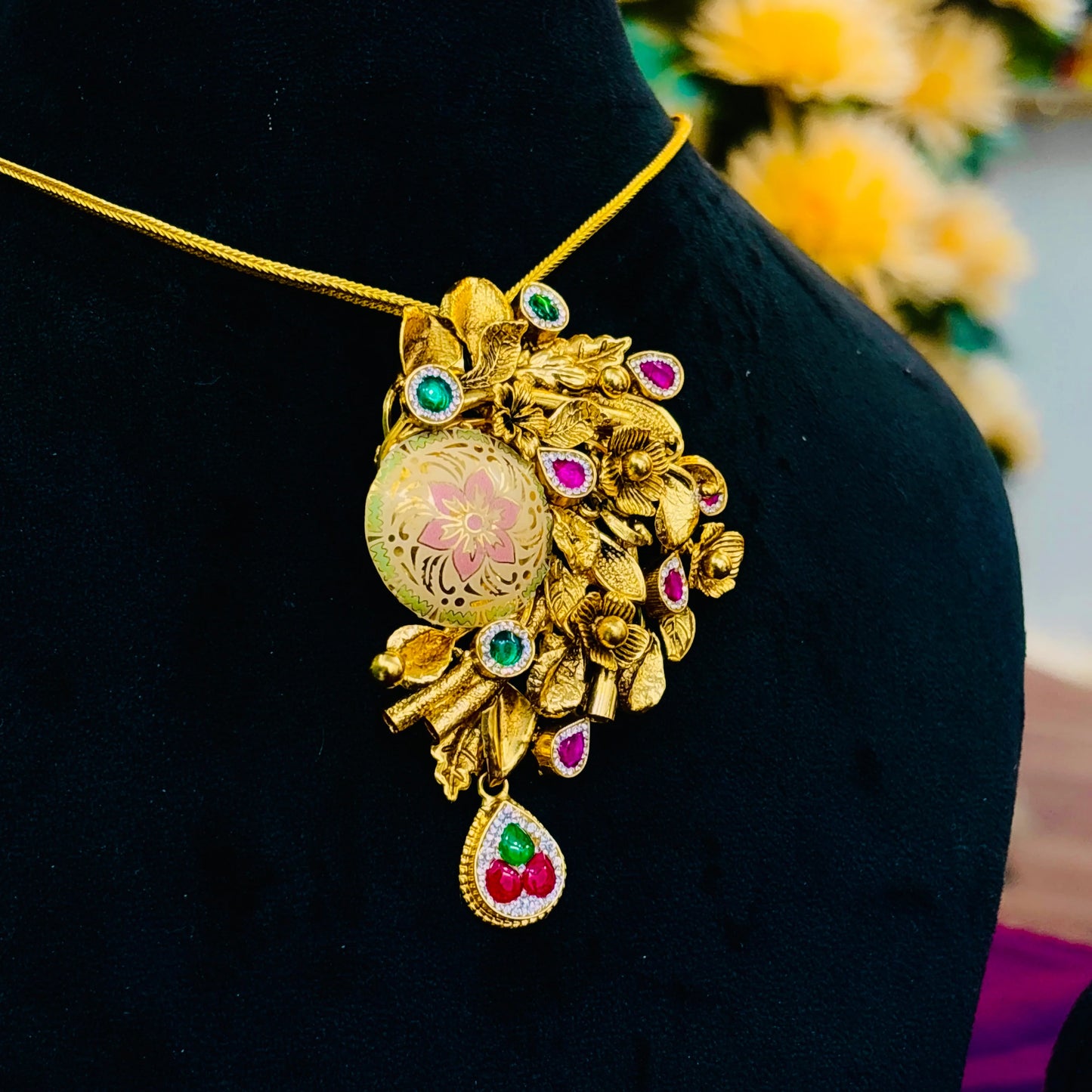 Glamorous Gold Polish Silver Necklace with Gold Leaves and Colorful Stone-Studded Flower.