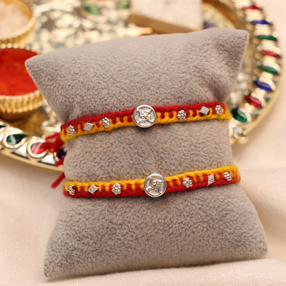 Swastik Charm Rakhi in Silver