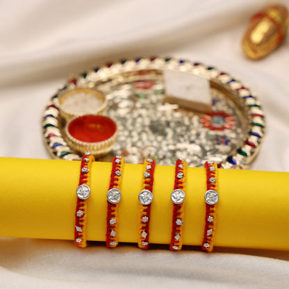 Swastik Charm Rakhi in Silver