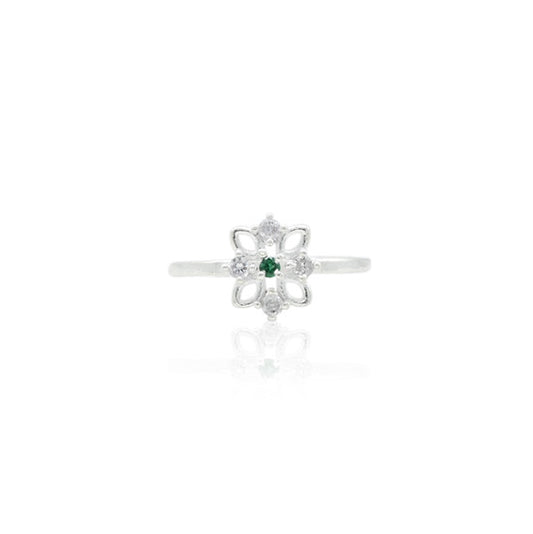 Silver ring featuring a precious emerald stone for an elite look.