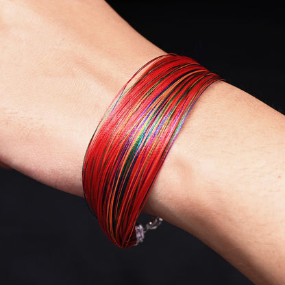 Timeless moli bracelet with colorful threads, offering a bold and lively addition to your accessory collection