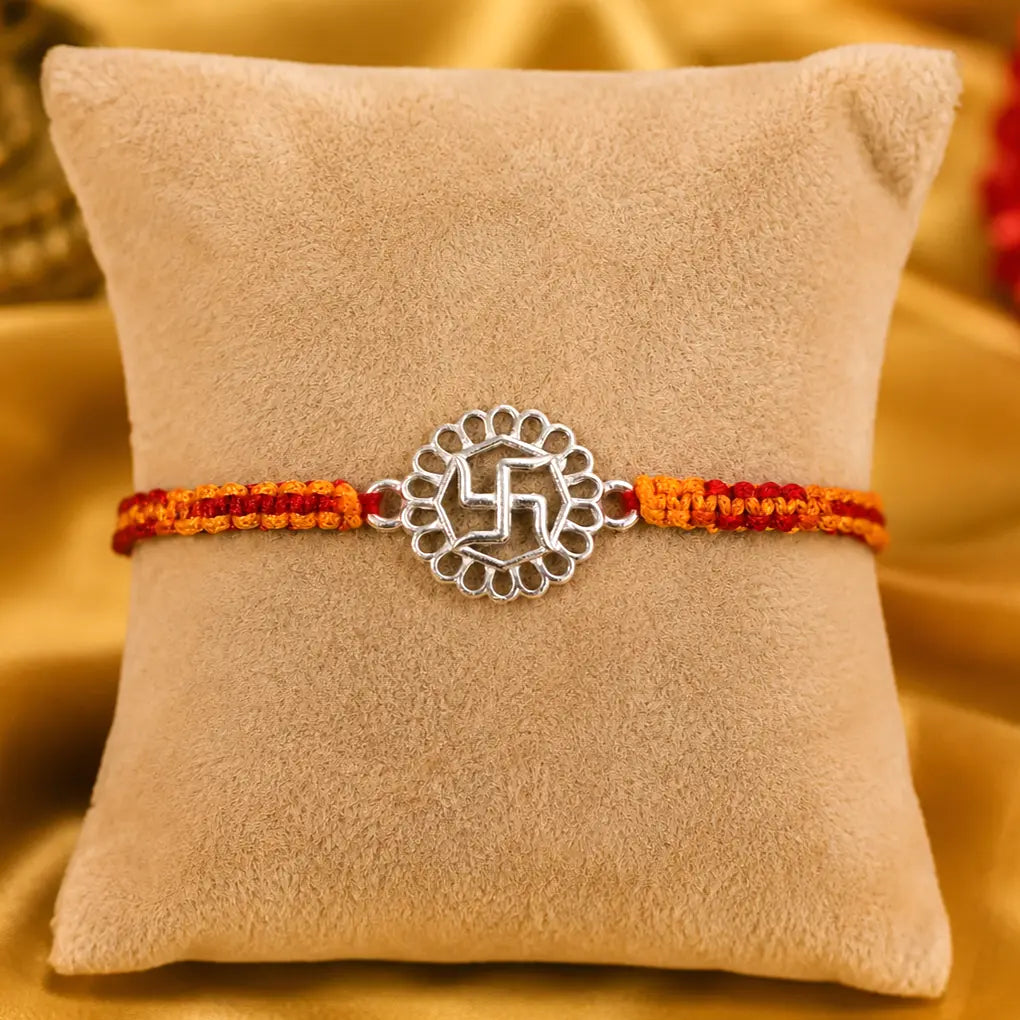 925 Sterling Silver Swastik Rakhi with handcrafted orange and red sacred thread for Raksha Bandhan