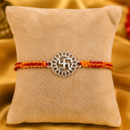 925 Sterling Silver Swastik Rakhi with handcrafted orange and red sacred thread for Raksha Bandhan