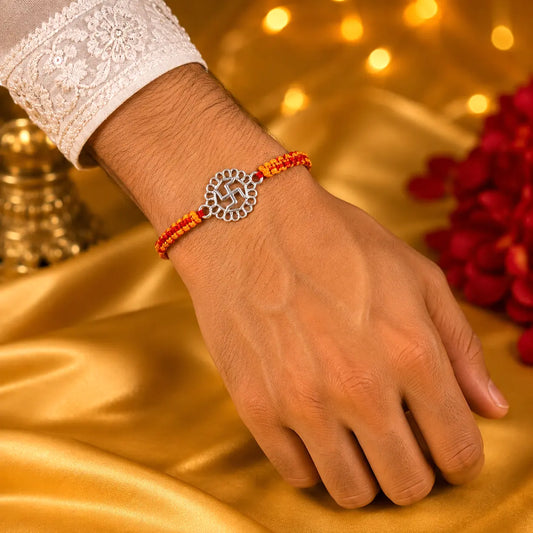 925 Sterling Silver Swastik Rakhi with handcrafted orange and red sacred thread for Raksha Bandhan