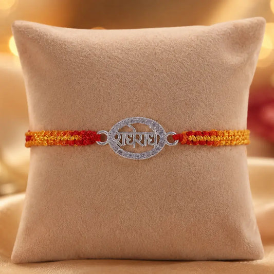 925 Sterling Silver Radhe Radhe Designer Rakhi with CZ Diamond Border and Red Yellow Sacred Thread for Raksha Bandhan
