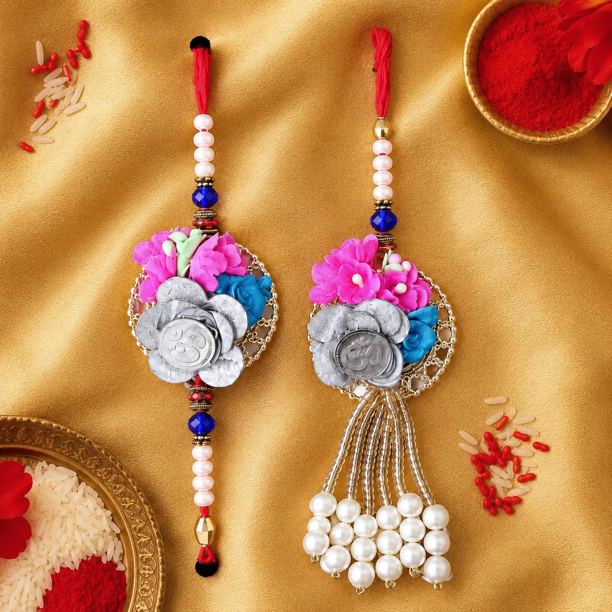 925 Silver Om Floral Rakhi Set with Pearl Lumba Rakhi for Bhai and Bhabhi featuring handcrafted pink blue flowers, pearl beads, and red thread for Raksha Bandhan.