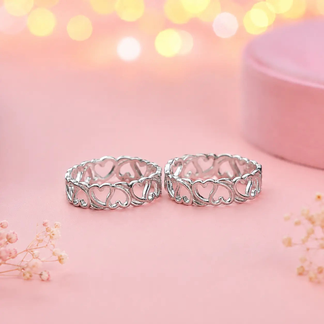 925 sterling silver adjustable heart design toe rings pair on soft pink background with luxury jewelry photography