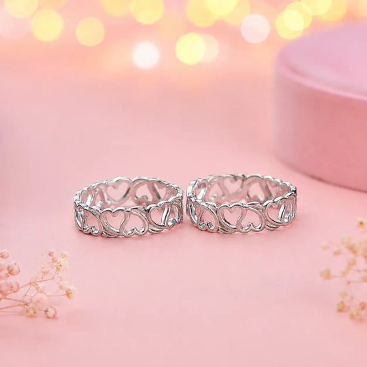 925 sterling silver adjustable heart design toe rings pair on soft pink background with luxury jewelry photography