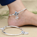 Silver kada payal for girls, featuring blue gemstone accents, silver beads, and ghungroos.