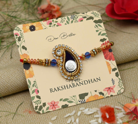 Silver center Ganesh Ji design with a black theme and colorful beads, perfect Rakhi for boys