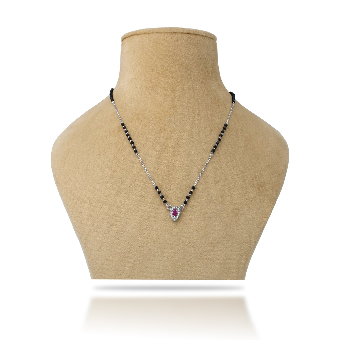 Silver mangalsutra featuring a striking purple stone for a vibrant touch