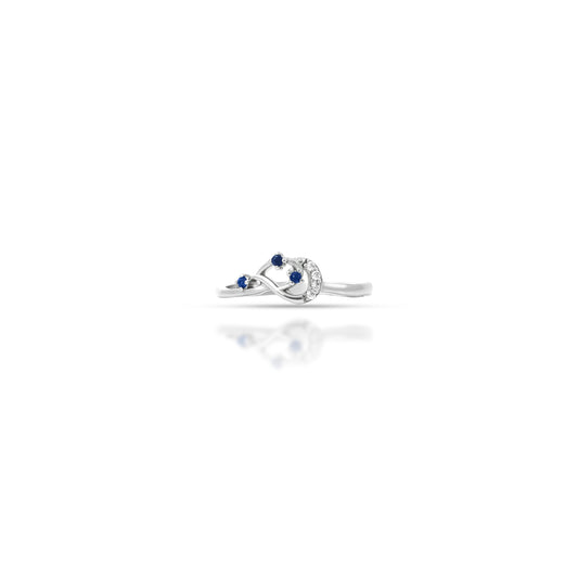 Stylish silver ring featuring three round blue stones for a chic look