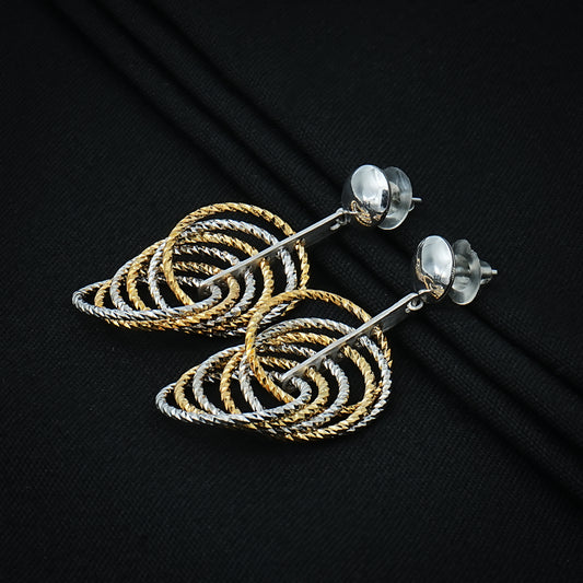 Stylish tiered silver earrings in a teardrop shape