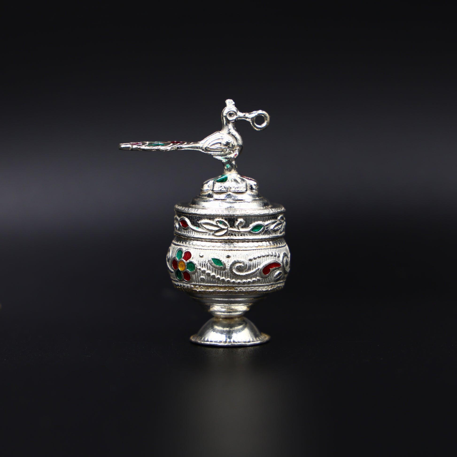 Exquisite silver peacock sindur box, adding a touch of tradition and beauty to your rituals.