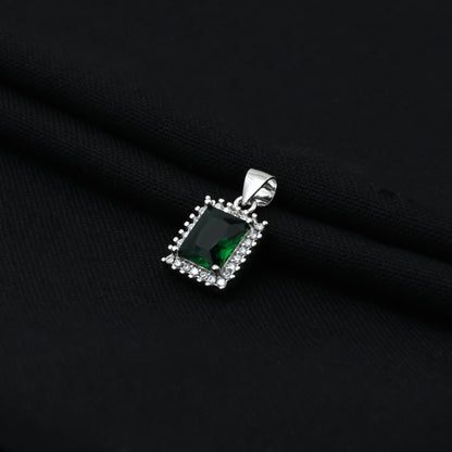 Charming silver pendant with a vibrant green gemstone, designed in a rectangular form for girls