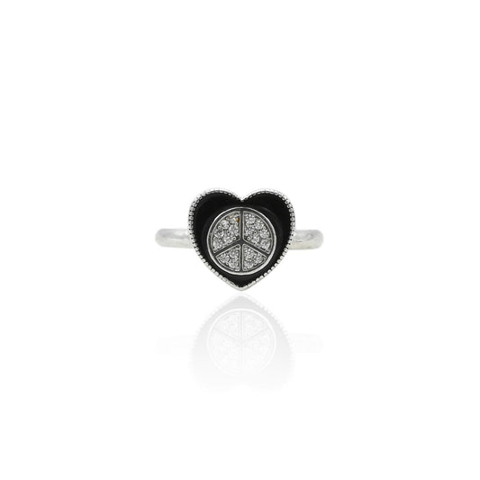 Silver ring featuring a twist design with a solitaire heart-shaped gemstone for a romantic look.