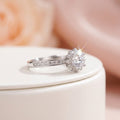 Discover the 925 Sterling Silver Halo Solitaire Engagement Ring with a sparkling round center stone and pavé band. Elegant jewelry for engagements and gifts.