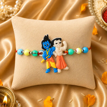 Bal Krishna Balram kids Rakhi with colorful beads on beige cushion