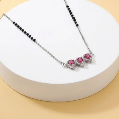 Beautiful Silver Mangalsutra Set Featuring a Vibrant Red Stone