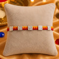 Blessed Swastik Buds Rakhi