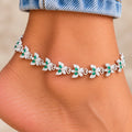 Graceful Flutter Silver Payal with Butterfly Motif and Green Gemstones