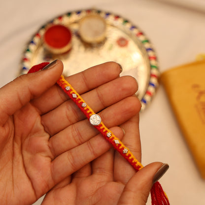 Swastik Charm Rakhi in Silver