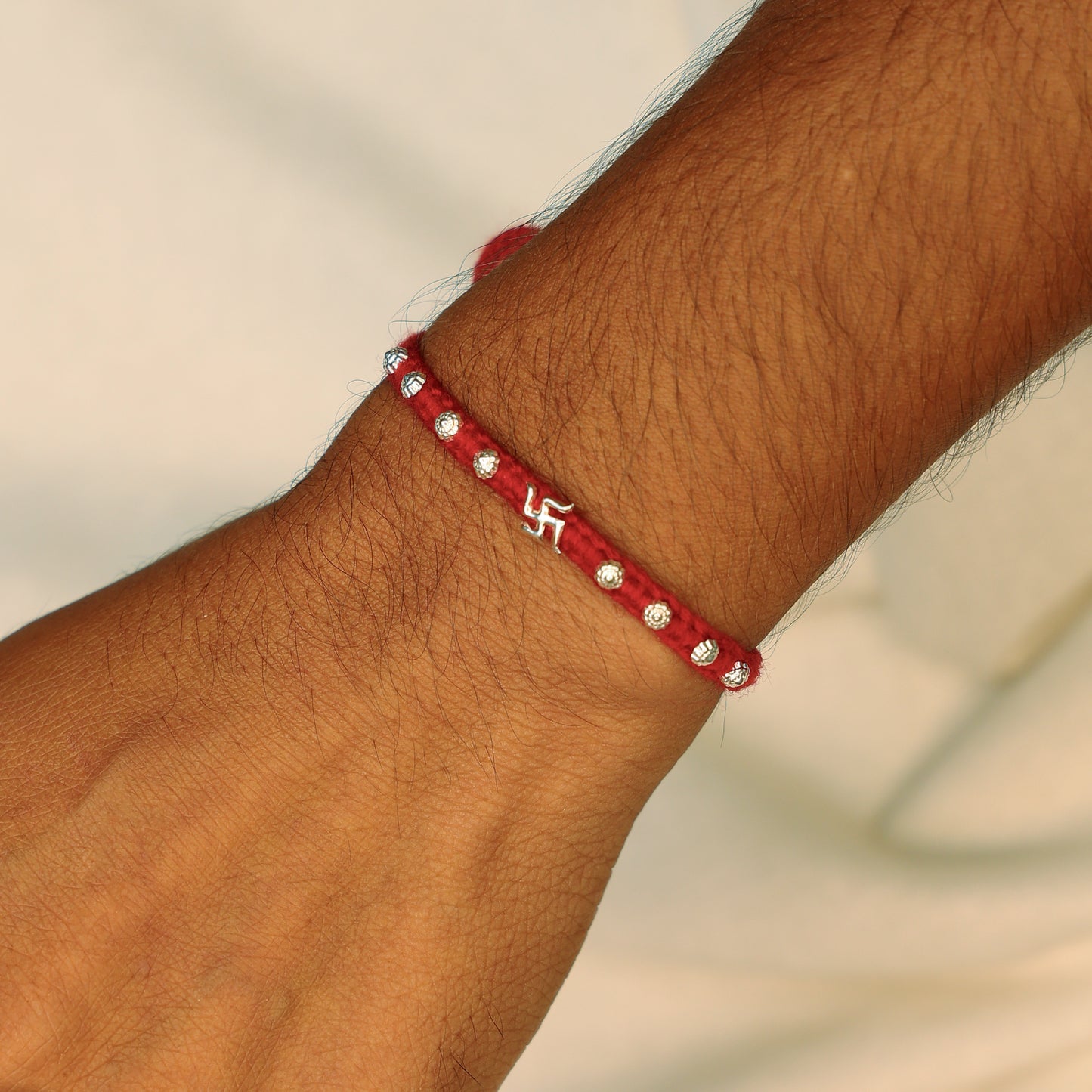Divine Swastika Silver Rakhi Thread
