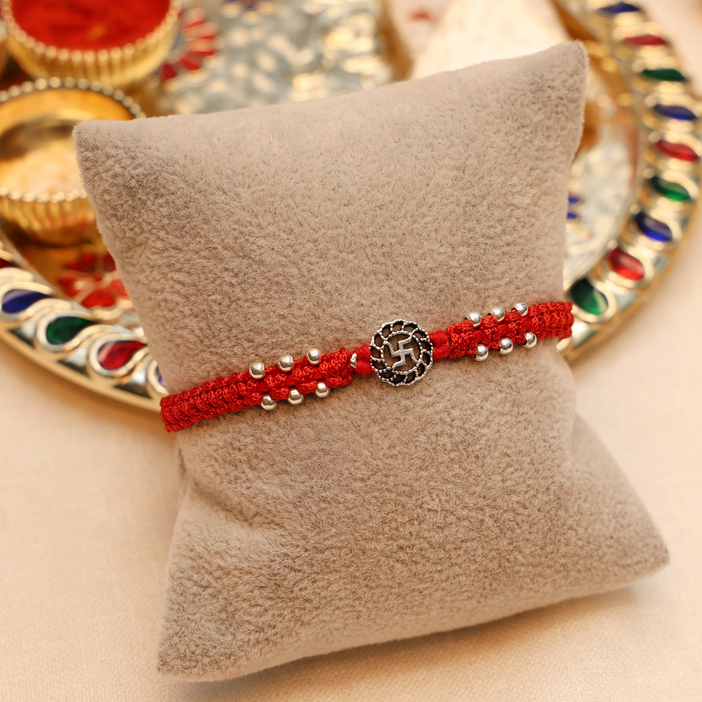 Traditional Swastik Buds Silver Rakhi