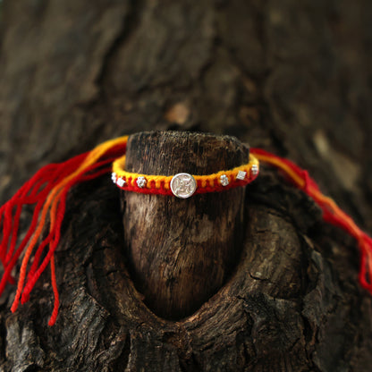 Swastik Charm Rakhi in Silver