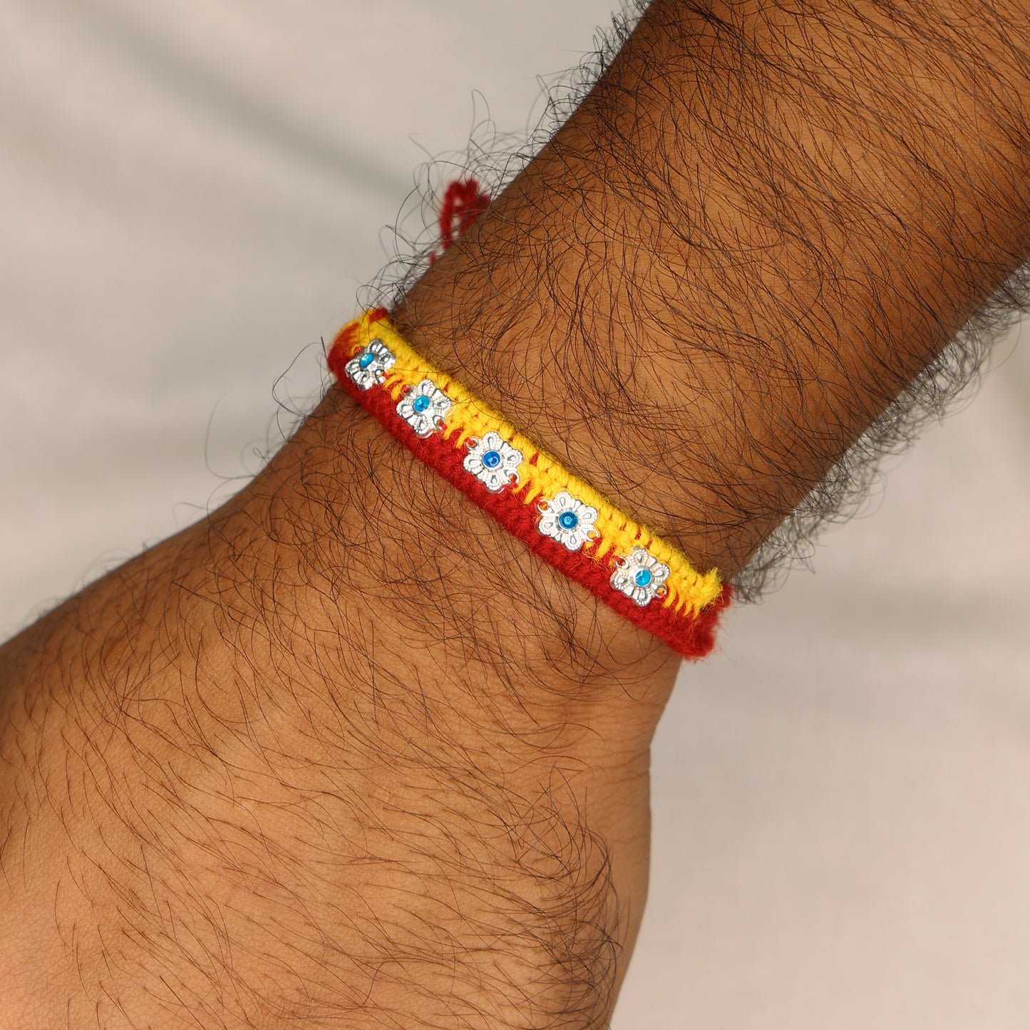 Delicate Silver Floral Rakhi