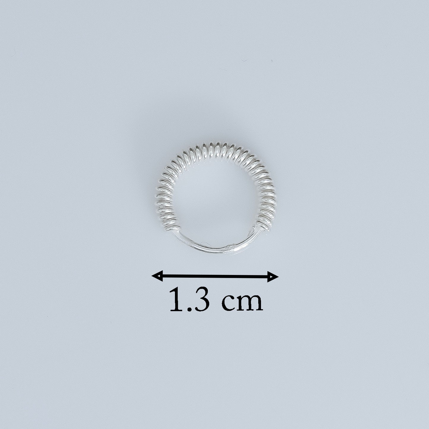 Elegant Coiled Design Silver Hoops