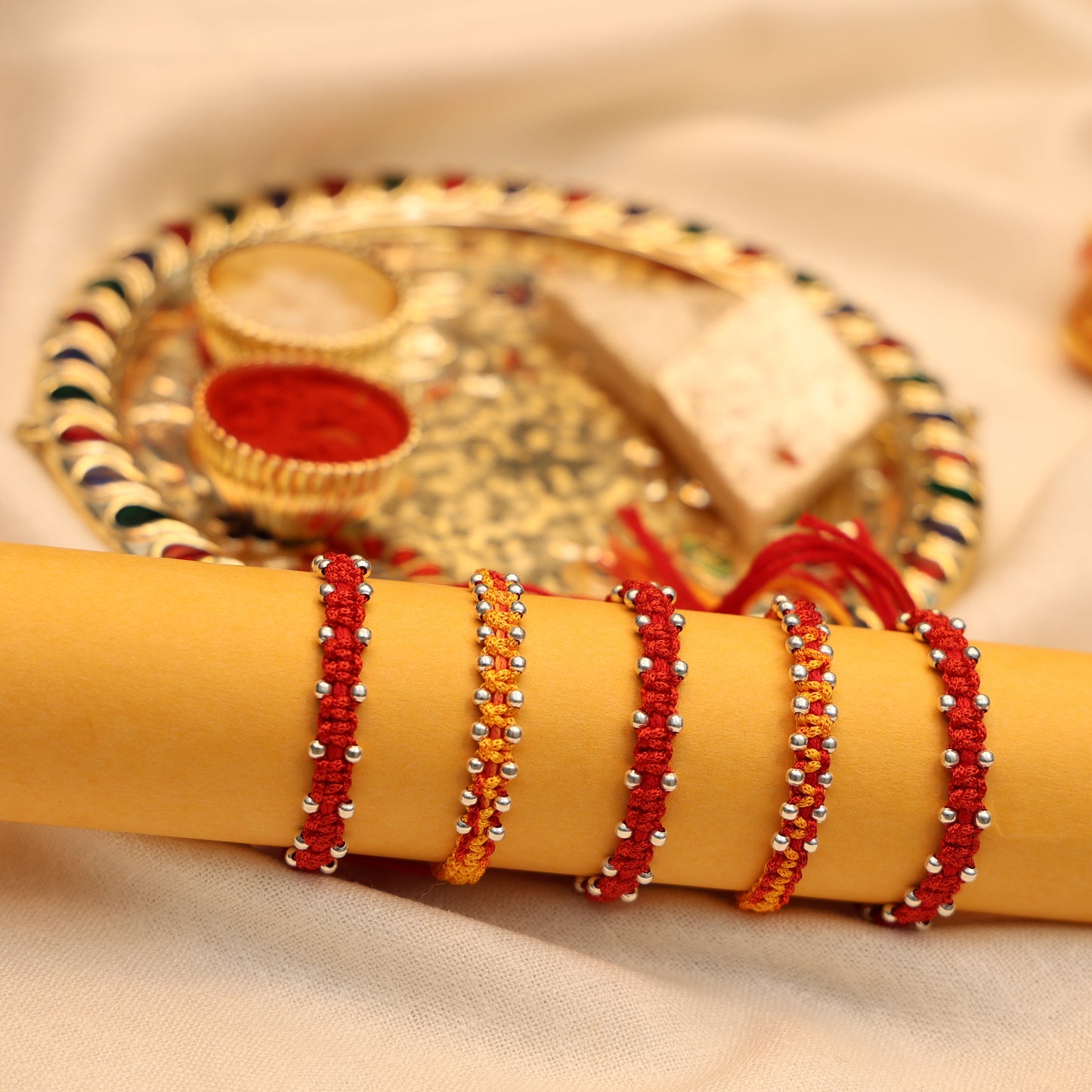 Unique Silver Rakhi with Bud Details