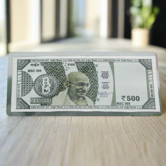 High-resolution image of the 999 pure silver 500 Rupees currency note with reflective surface.