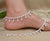 Silver anklet featuring large beads and stunning gem accents for a bold look