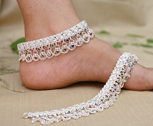Silver heavy bridal anklet adorned with colorful beads for a festive look