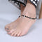 Silver Anklet with Black Moti and Detailed Silver Leaves