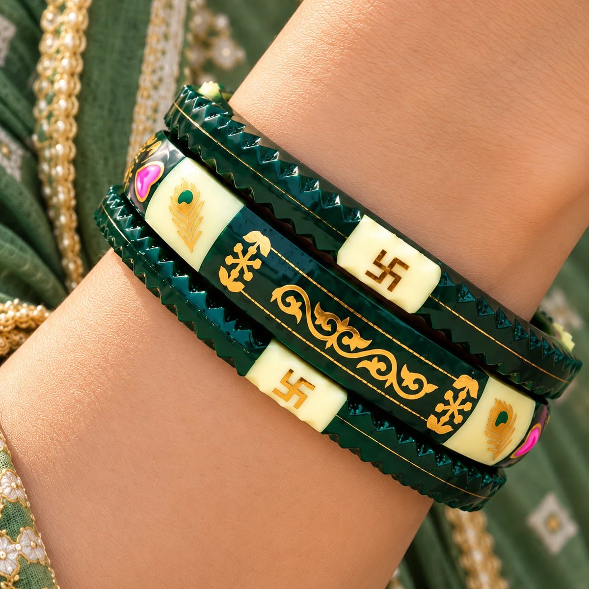 Dark Green Traditional Designer Bangles with Golden Swastika & Peacock Motifs