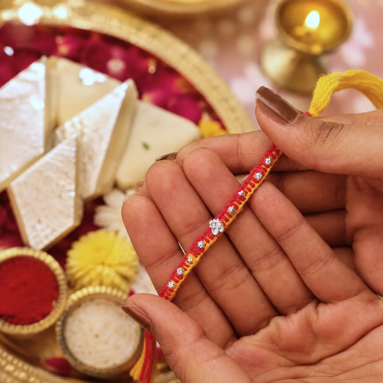 Divine Om Silver Rakhi Thread 