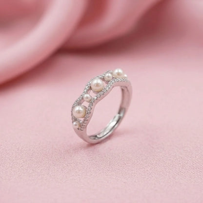 Elegant Wave Pearl and Diamond Band Ring in Sterling Silver