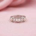 Elegant Wave Pearl and Diamond Band Ring in Sterling Silver