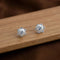 Elegant Floral Silver Stud Earrings with Sparkling Stone