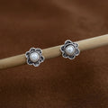 Floral Silver Stud Earrings with Sparkling Stone