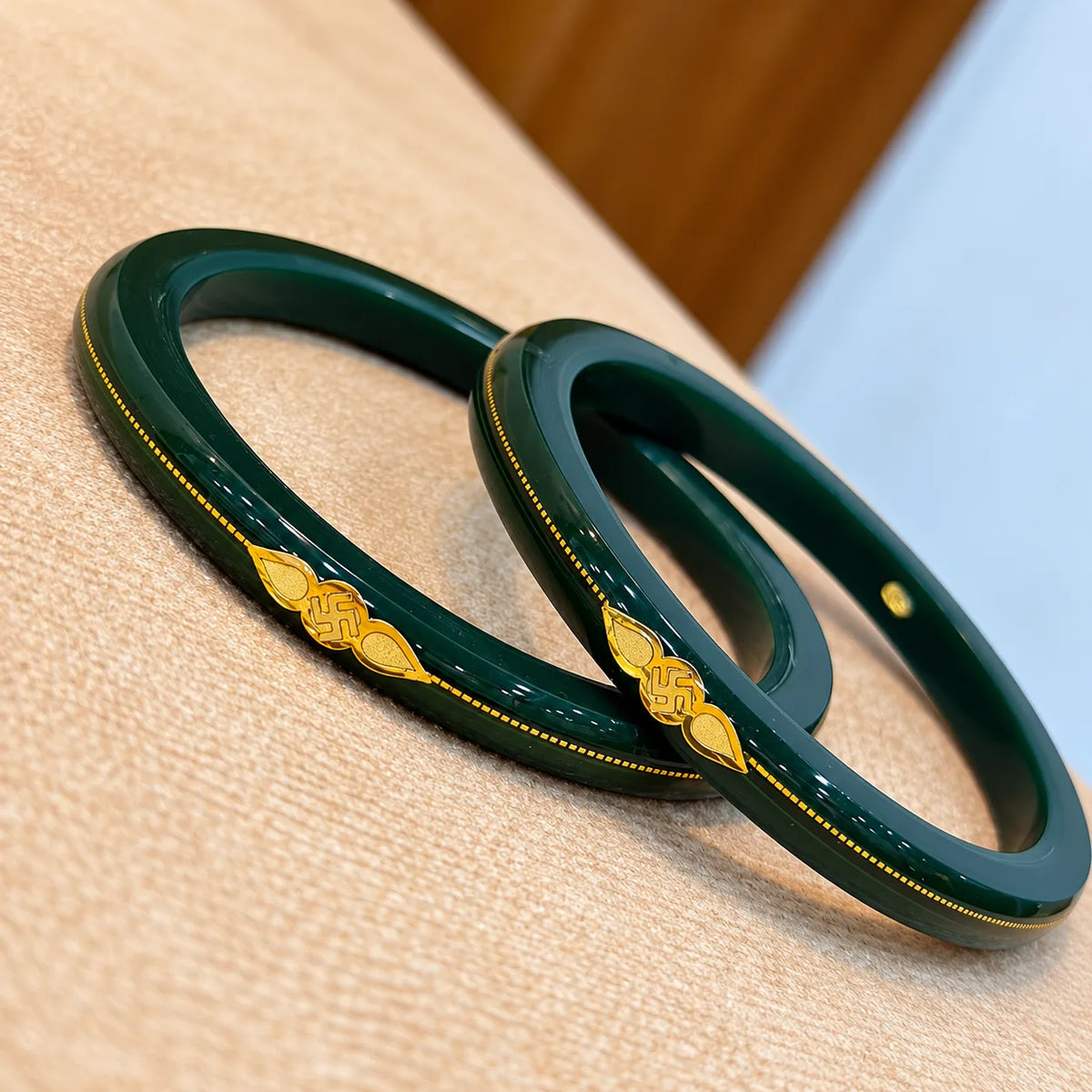 Gold Small Swastika Design Dark Green Bangle