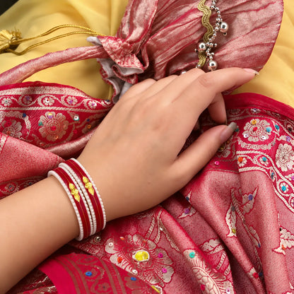Gold Small Swastika Design light and Dark Red Bangle.
