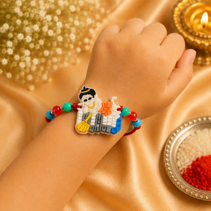 Colorful Hanuman Rakhi with Bal Hanuman design and multicolor beads on beige cushion