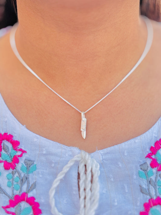 Minimalist silver knife pendant for girls on a delicate chain