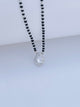 Elegant Black Bead Mangalsutra with Teardrop Gemstone Pendant